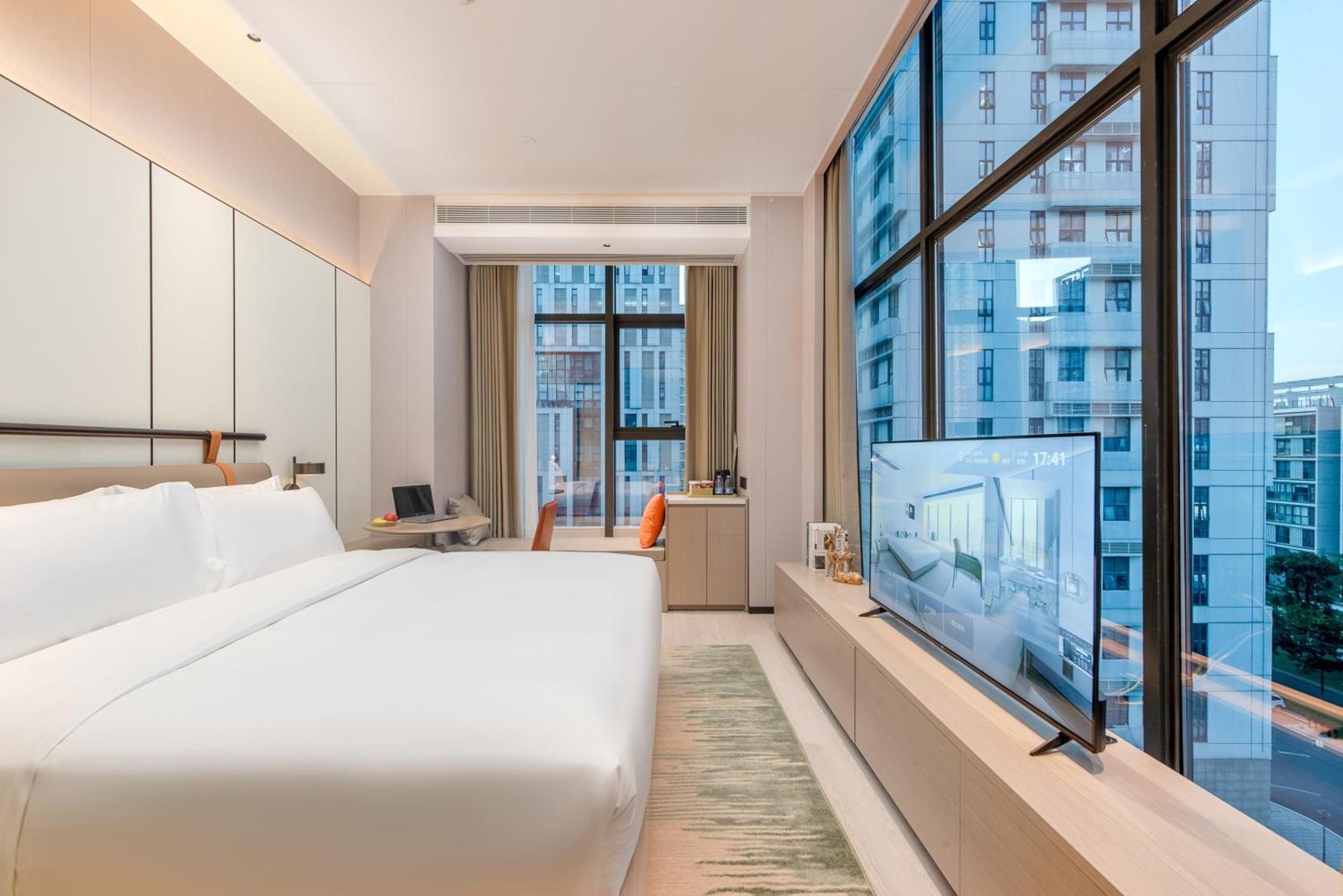 Oness Executive Hotel Guangzhou Huangpu Luogang - Free Shuttle Bus For Canton Fair Exteriör bild
